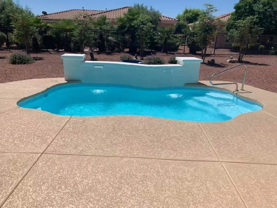 Ariella fiberglass pool installed in a backyard