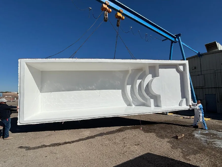 Canyon Beach Grande fiberglass pool installed in a backyard