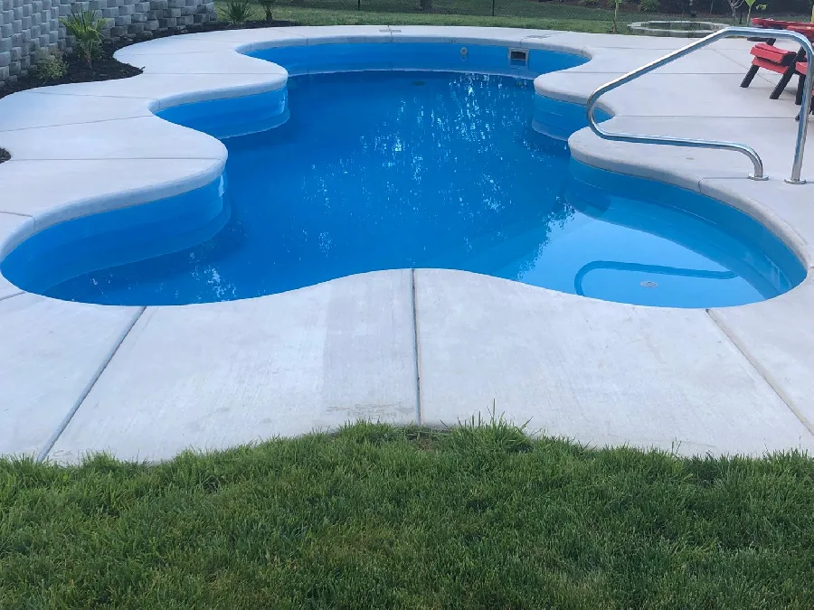 Desert Falls fiberglass pool installed in a backyard