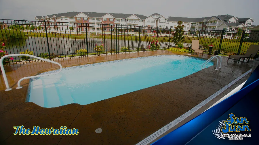 Hawaiian fiberglass pool installed in a backyard