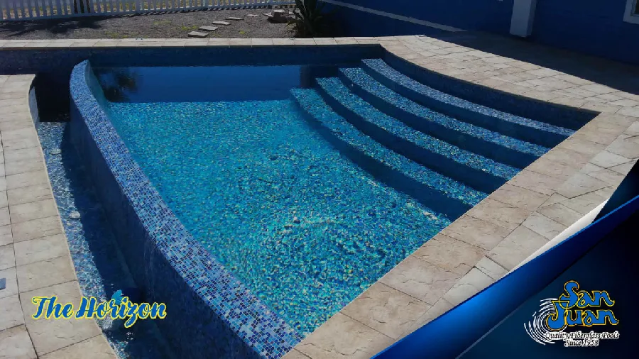 Horizon fiberglass pool installed in a backyard