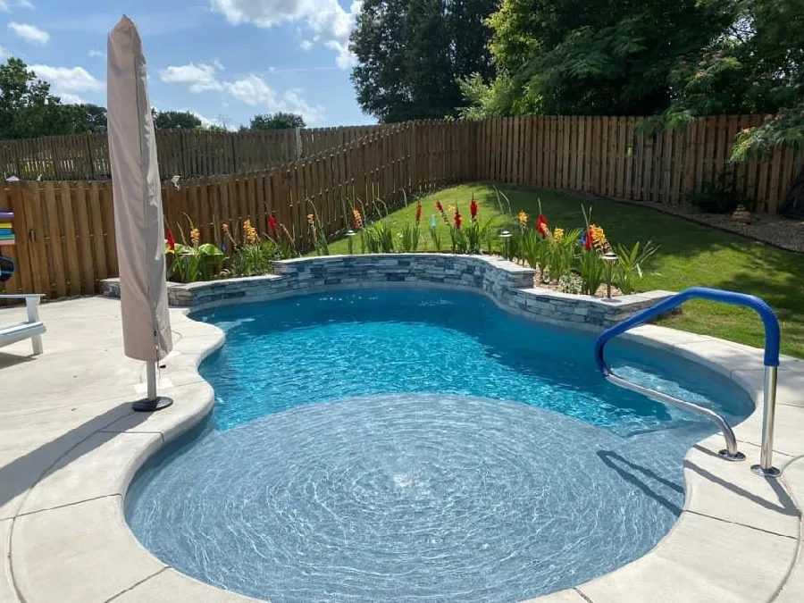 Huntington Beach fiberglass pool installed in a backyard