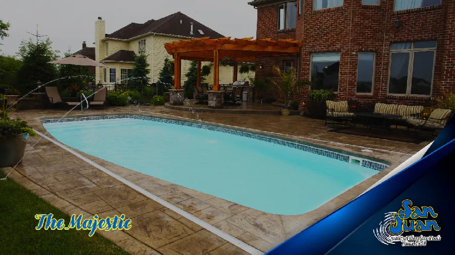 Majestic fiberglass pool installed in a backyard