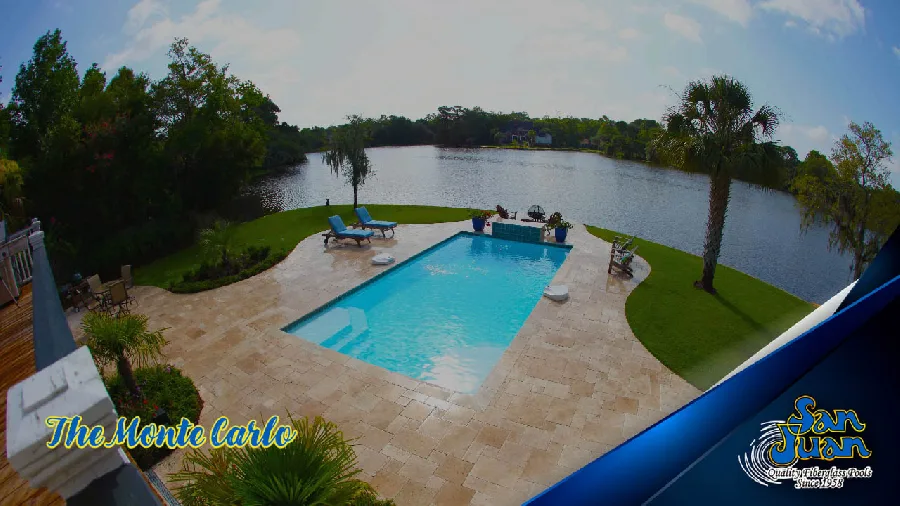 Monte Carlo large San Juan fiberglass pool installed in a backyard