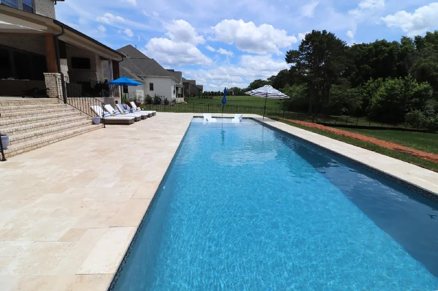 Oceanside Beach fiberglass pool installed in a backyard