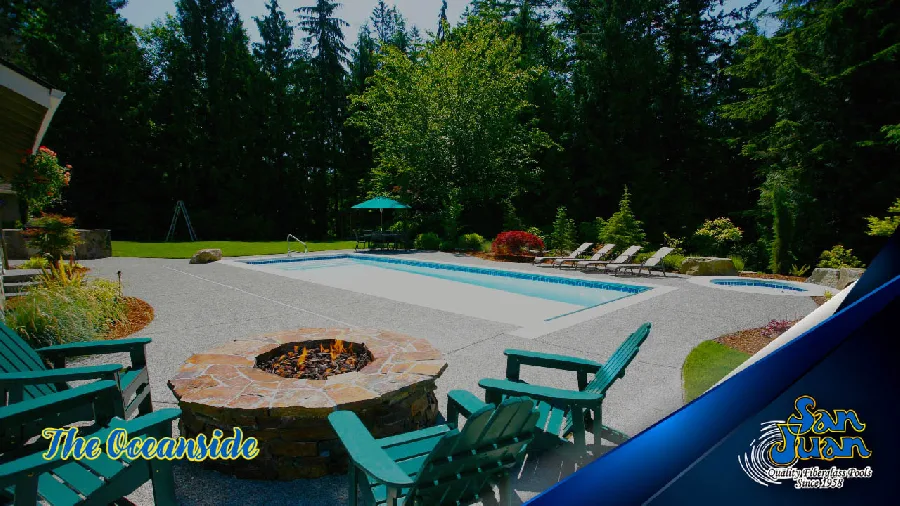 Oceanside fiberglass pool installed in a backyard