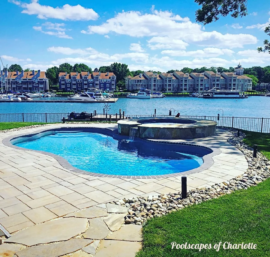 Star Dust fiberglass pool installed in a backyard