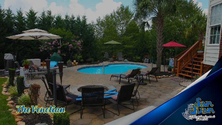Venetian fiberglass pool installed in a backyard