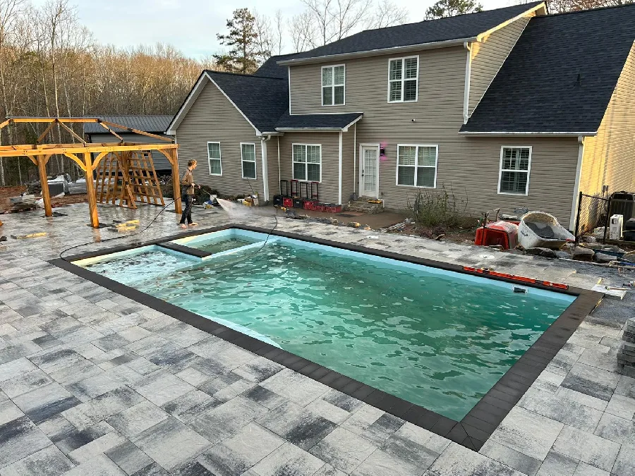 Wylela Cove Grande fiberglass pool installed in a backyard