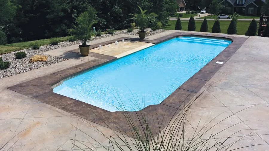 Cancun fiberglass pool installed in a backyard