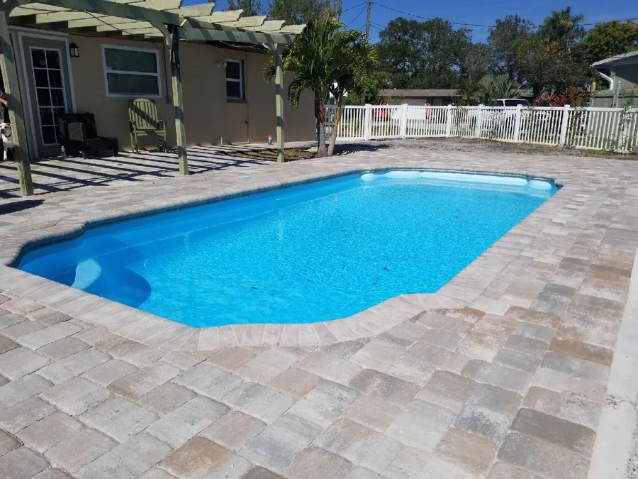 Freeport fiberglass pool installed in a backyard