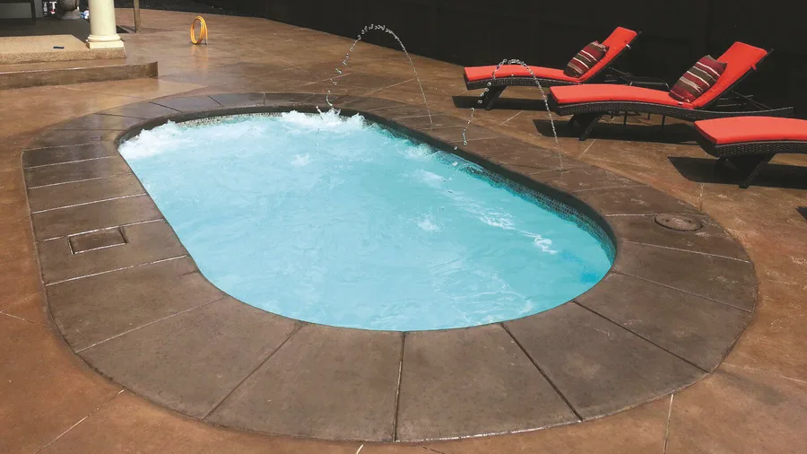 Key West fiberglass pool installed in a backyard