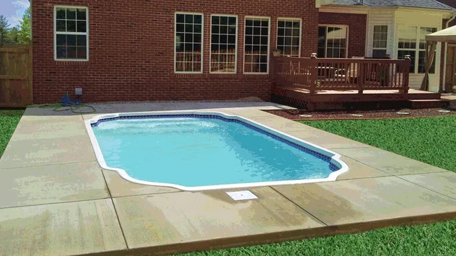 Kingston fiberglass pool installed in a backyard