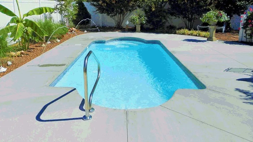 Meridia fiberglass pool installed in a backyard
