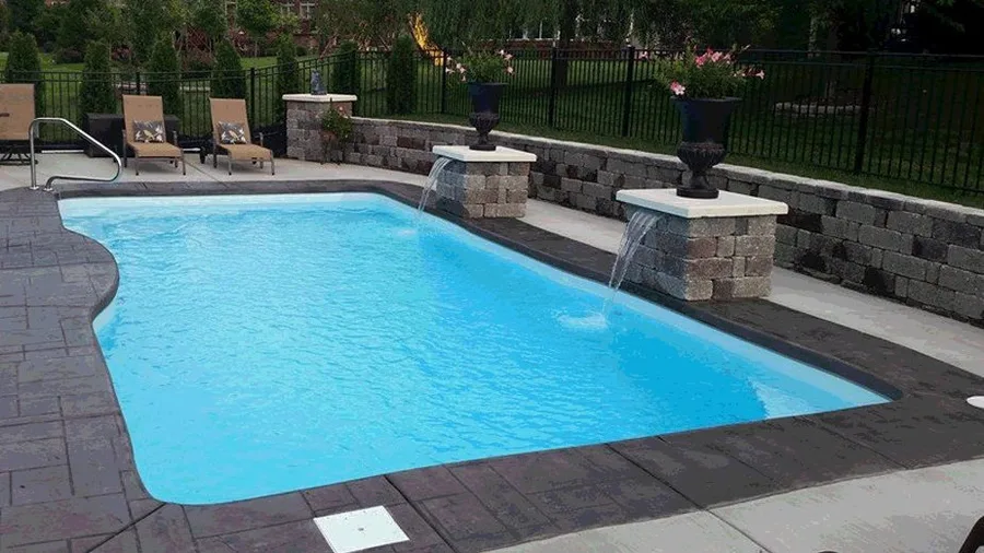 Rio fiberglass pool installed in a backyard