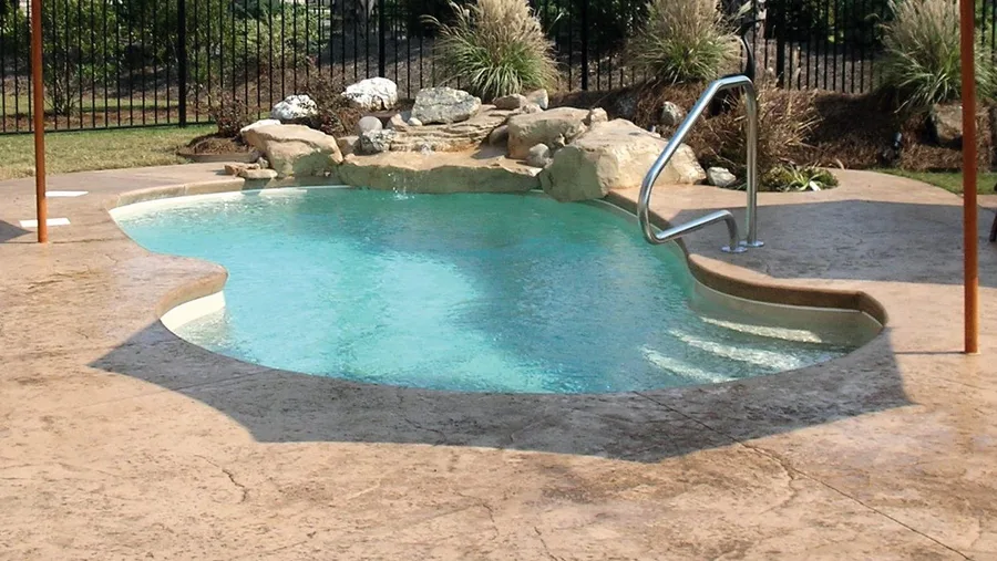 Sanibel small fiberglass pool installed in a backyard