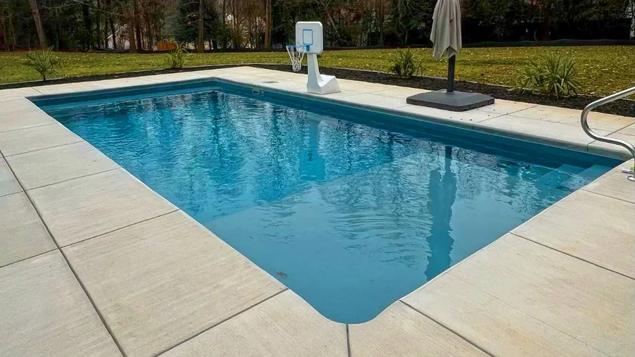 St. John fiberglass pool installed in a backyard