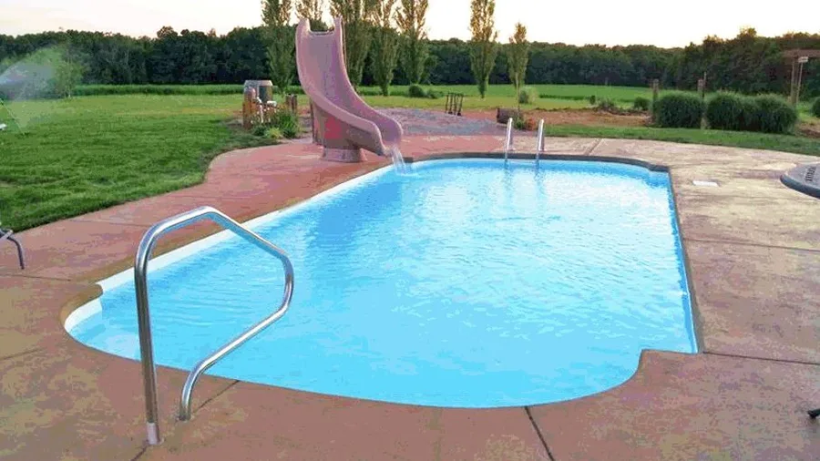 St. Thomas fiberglass pool installed in a backyard