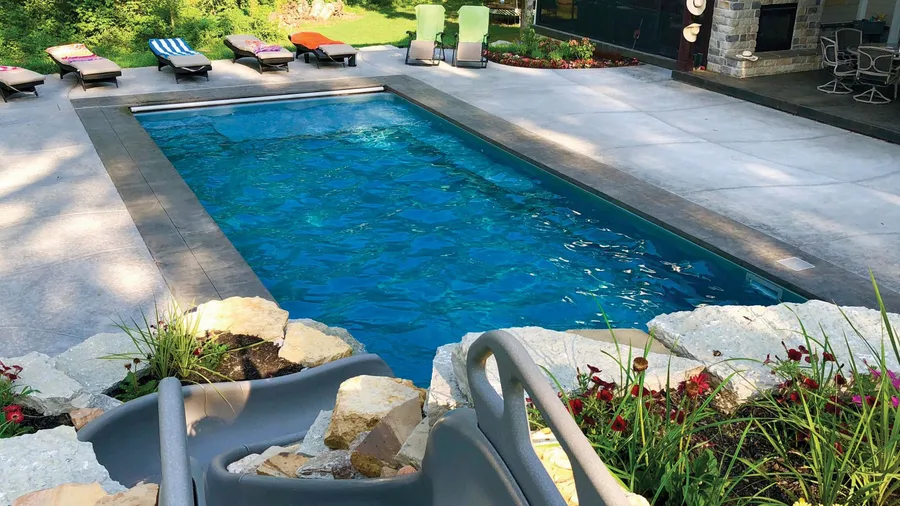 Tahiti fiberglass pool installed in a backyard